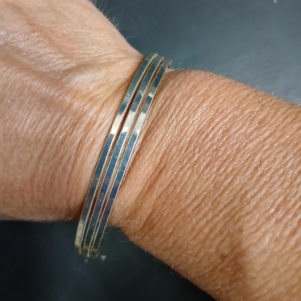 Silvertone cuff bracelet adjustable